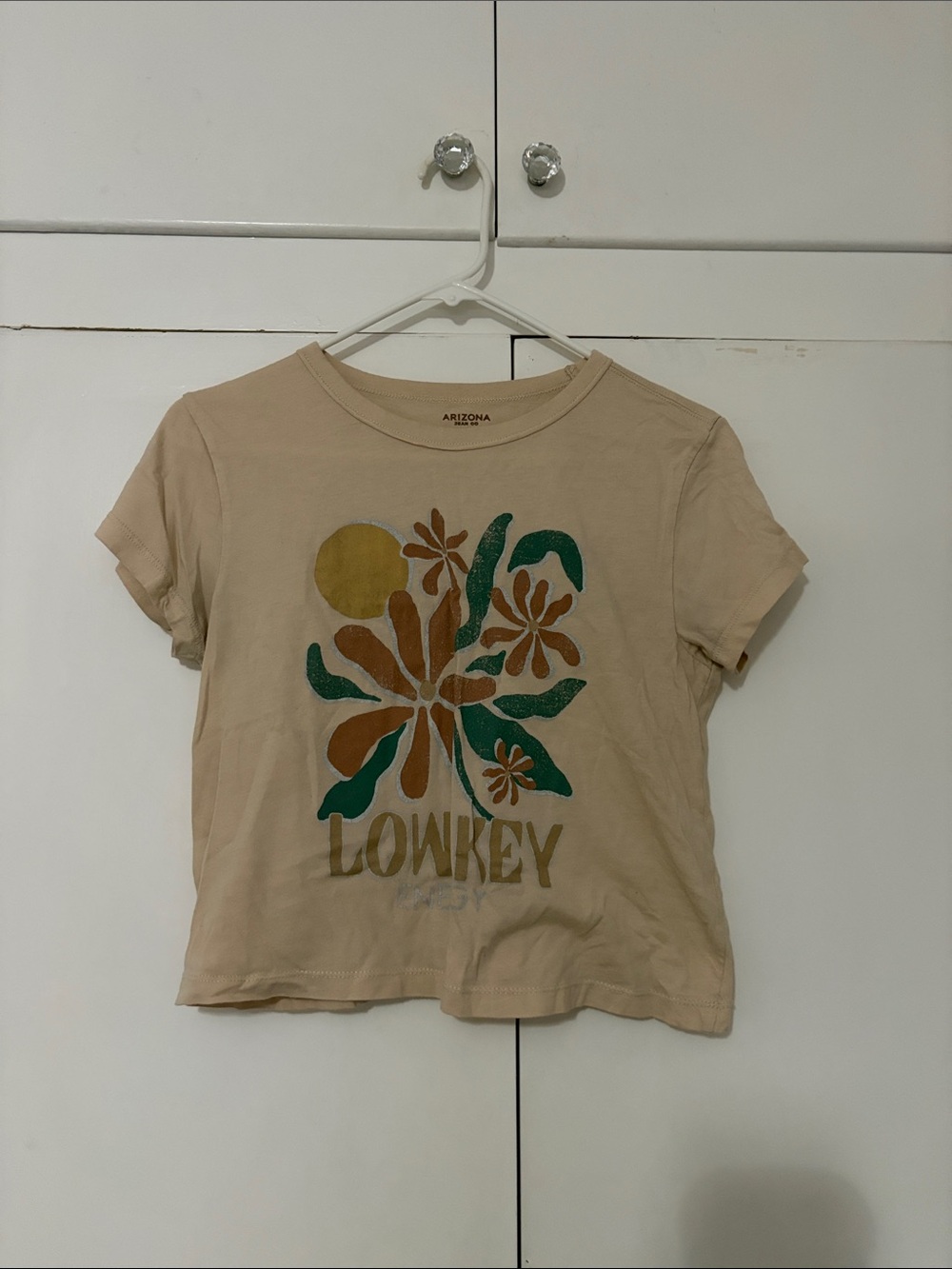 Arizona Jean Company Beige Graphic Crop Tee with Green & Brown Floral Motif